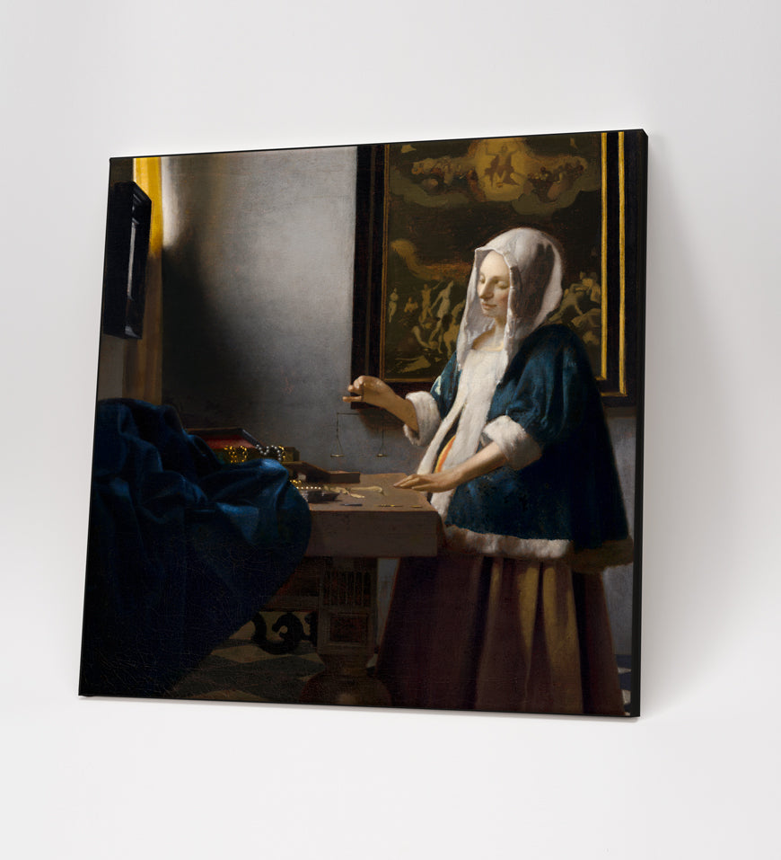 Johannes Vermeer Woman Holding a Balance (ca.1664)